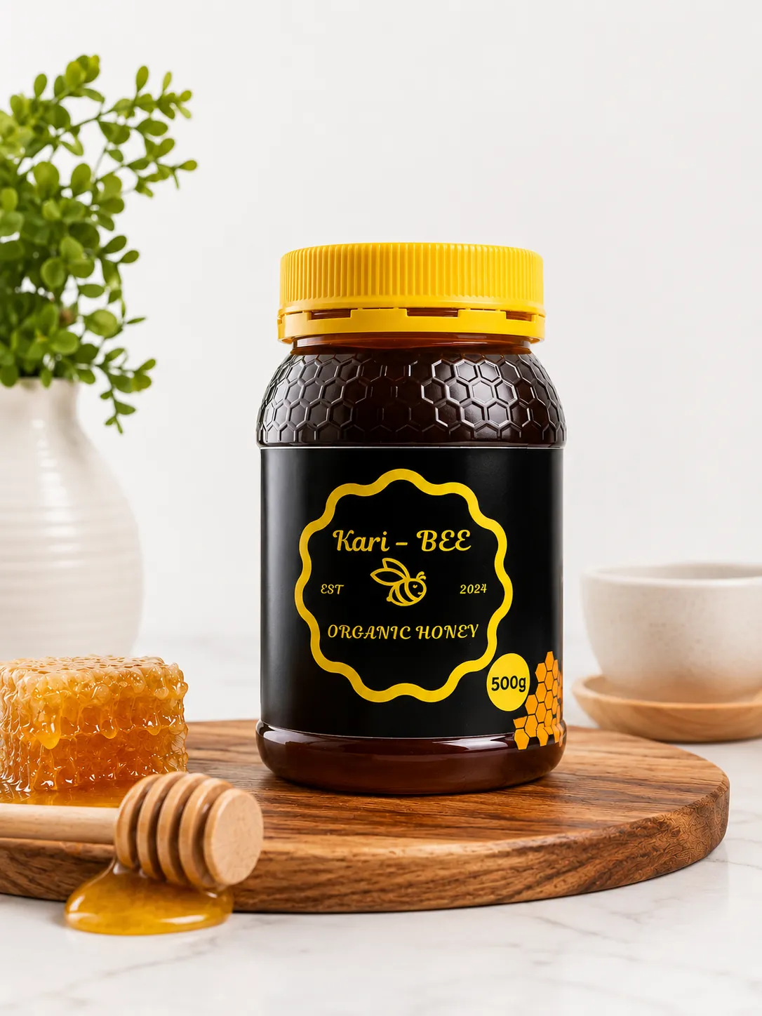 Jar of Kari-BEE raw honey with honeycomb and dipper